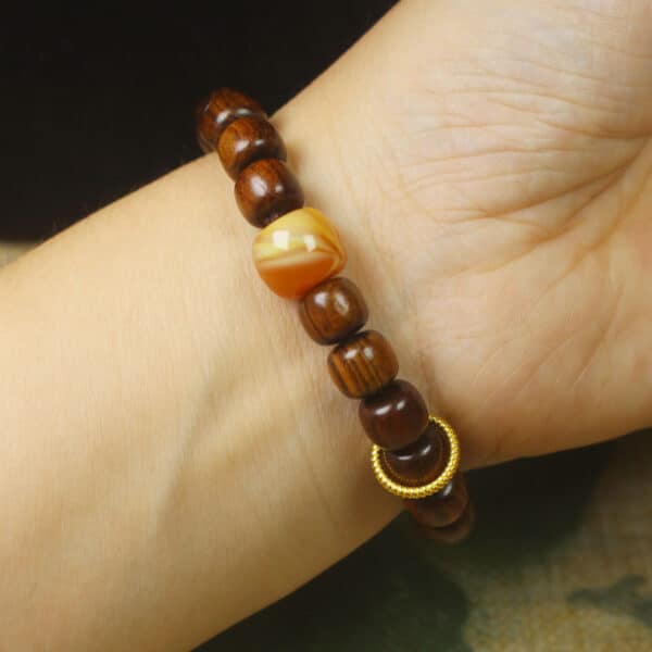 O1CN01eRftZb1X6LI0LClEl_!!1848402874-0-cib Black Pear Buddhist Bead Bracelet