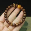 O1CN01j8WDZp1X6LHySoGWq_!!1848402874-0-cib Black Pear Buddhist Bead Bracelet