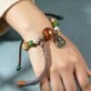 21505b64d91c993860fae793012847ea The Grounding Guardian: Natural Sheep Horn Handstrung Bracelet