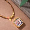 2547e35b72485ac2b17e2f56cc2613cc The Blessing Talisman: Thangka Pendant with Tiger's Eye Beaded Chain
