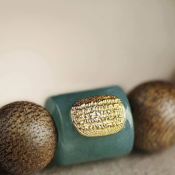 The Path Opener: Natural Agarwood & Jade Lulutong Mala Bracelet