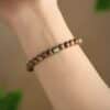 The Path Opener: Natural Agarwood & Jade Lulutong Mala Bracelet