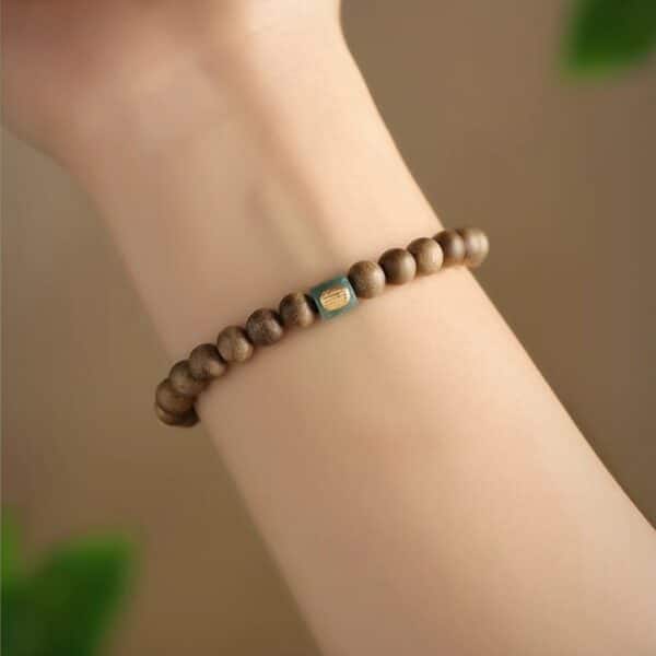 The Path Opener: Natural Agarwood & Jade Lulutong Mala Bracelet