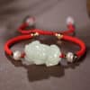 O1CN0130KpQ11cn0OVxT683_!!2220327283644-0-cib The Harmony Guardian: Nephrite Jade & Red String Bracelet