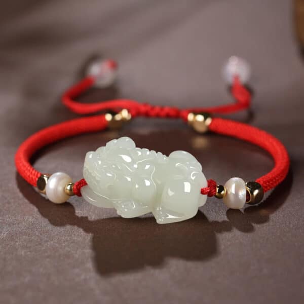 O1CN0130KpQ11cn0OVxT683_!!2220327283644-0-cib The Harmony Guardian: Nephrite Jade & Red String Bracelet