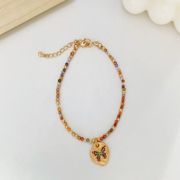 The Rainbow Transformation: Traditional Enamel Butterfly Beaded Bracelet