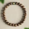 The Path Opener: Natural Agarwood & Jade Lulutong Mala Bracelet
