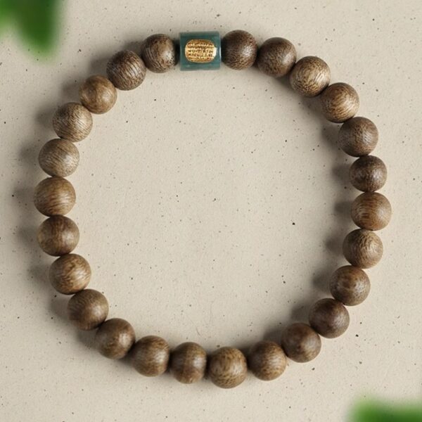 The Path Opener: Natural Agarwood & Jade Lulutong Mala Bracelet