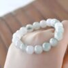 downloaded-image (1) The Serenity String: Golden Thread White Jade Bracelet