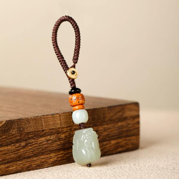 The Fortune Guardian: Hand-Carved Hetian Jade Pixiu Key & Bag Hanging Charm
