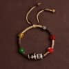Tibetan Blessing Talisman: Dzi Bead Braided Bracelet
