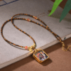 主图1 The Blessing Talisman: Thangka Pendant with Tiger's Eye Beaded Chain