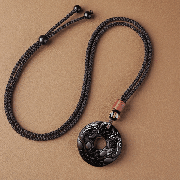 The Abundance Guardian: Natural Obsidian Double Pixiu Peace Buckle Pendant