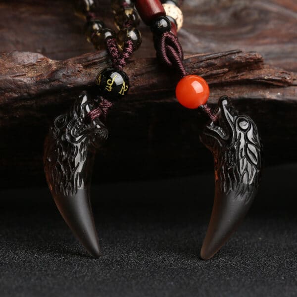 The Alpha Spirit: Natural Volcanic Obsidian Wolf Tooth Pendant