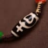 Tibetan Blessing Talisman: Dzi Bead Braided Bracelet