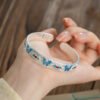 主图-2 The Serenity Flutter: 999 Sterling Silver Enamel Butterfly Heart Sutra Cuff Bracelet