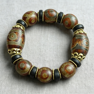 The Fortune Talisman: Tibetan 3-Eye & 9-Eye Dzi Agate Bracelet