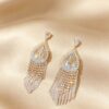 Symbol of Glamour & Grace: Teardrop Crystal Tassel Earrings S925 Post