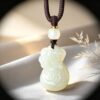 Symbols of Prosperity: Natural Hetian Nephrite Jade Pouch Pendant