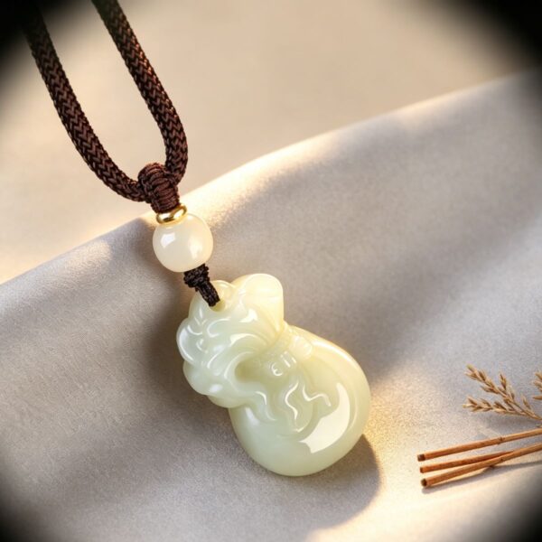 Symbols of Prosperity: Natural Hetian Nephrite Jade Pouch Pendant