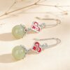 The Serenity Bloom: Auspicious Cloud Hetian Jade Drop Earrings S925 Sterling Silver
